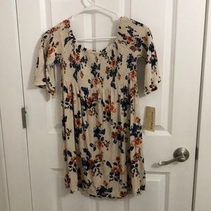 Off the shoulder floral dress.